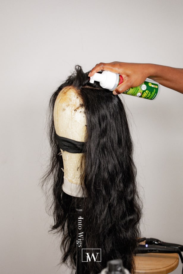 Process of creating a parting section on the wig